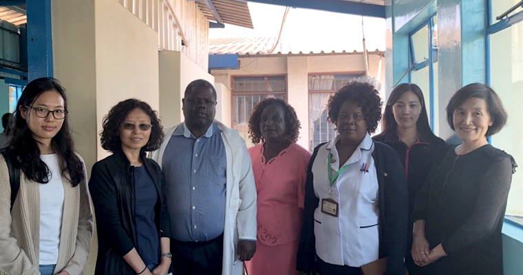 Photo shows Haeok Lee with nurses and researchers at Kamuzu Central Hospital in Malawi.