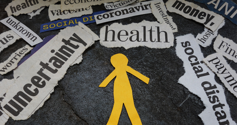 Graphic shows figure surrounded by words like uncertainty, money, covid, health.